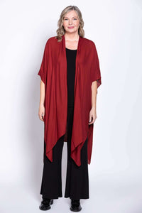 Front-facing view of a woman modeling the crimson Darcy kimono wrap