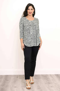 Front angle view of Jazz Bamboo Top paired with black pants