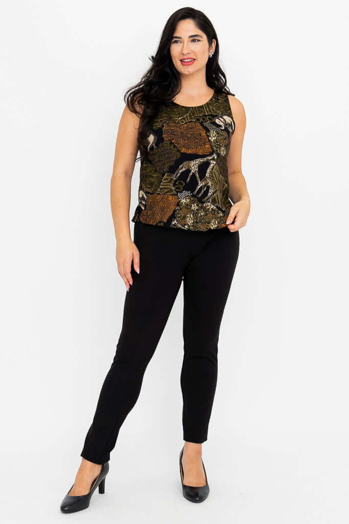 Full-length front view of woman in safari print tank top, smiling and looking to the side
