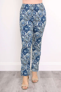 Front view of printed blue and white slim fit pants with elastic waistband