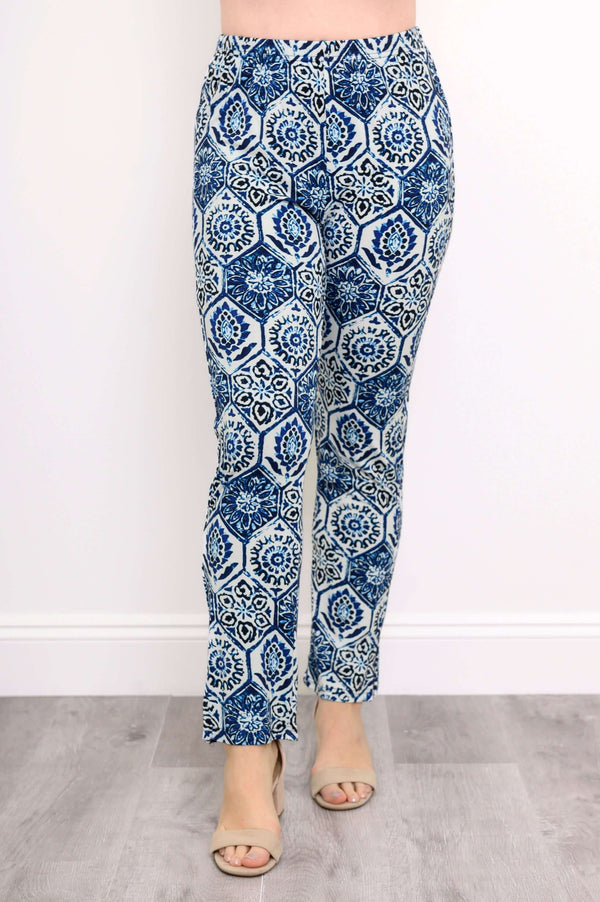 Front view of printed blue and white slim fit pants with elastic waistband