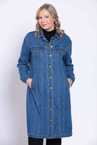 Front close-up of Geraldine denim jacket with model's hands in pockets