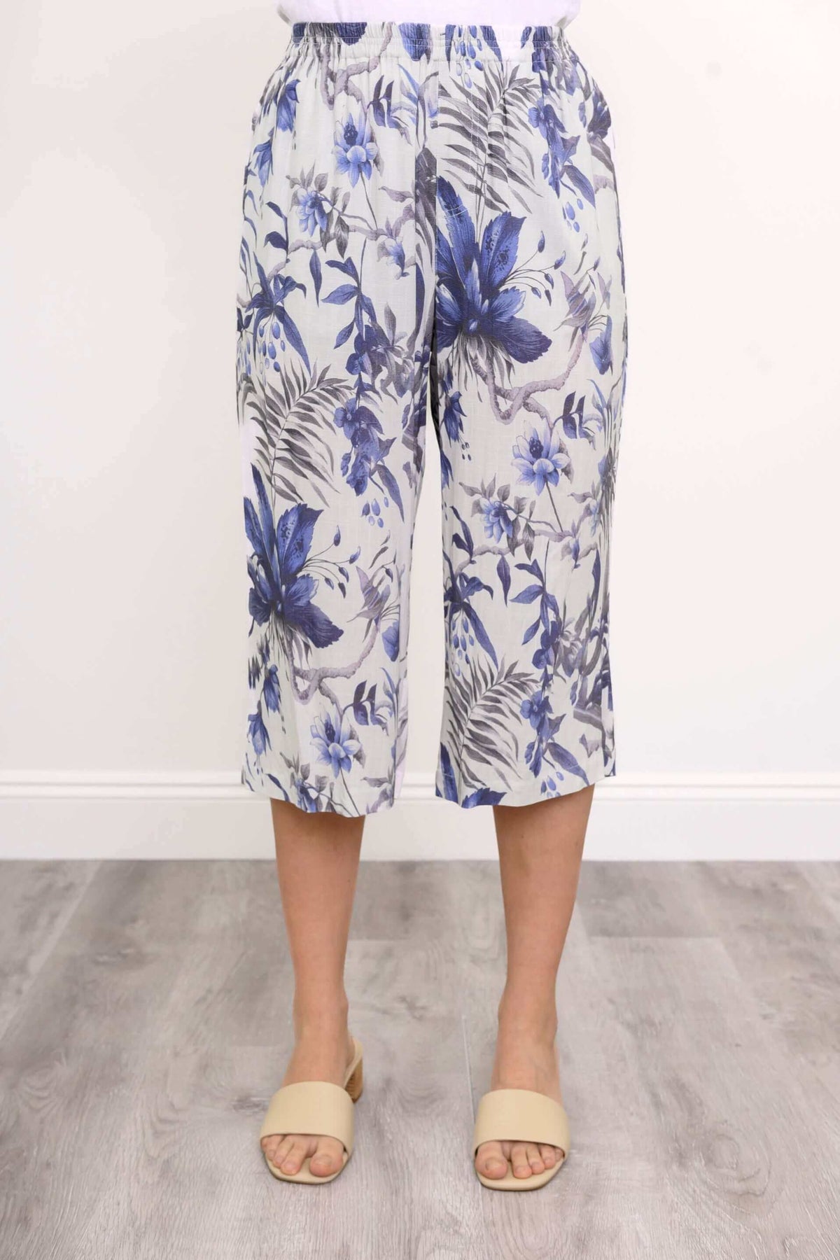 Front close-up of blue floral Bella Capri Pant