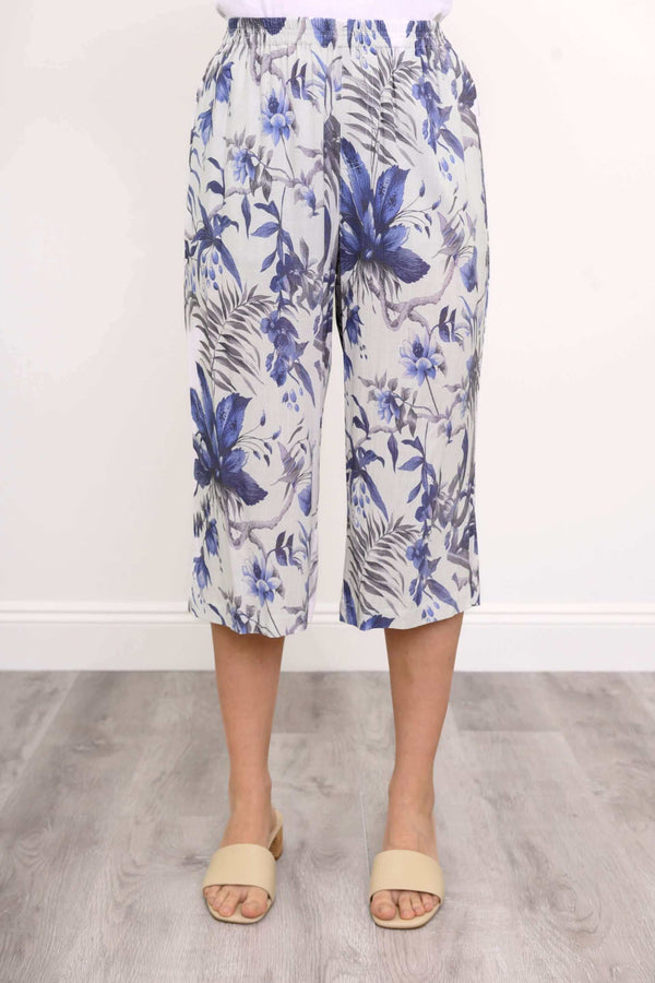 Front close-up of blue floral Bella Capri Pant