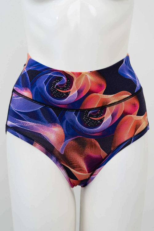 Front view of high-waisted brief with vibrant blue, orange, and purple swirl print