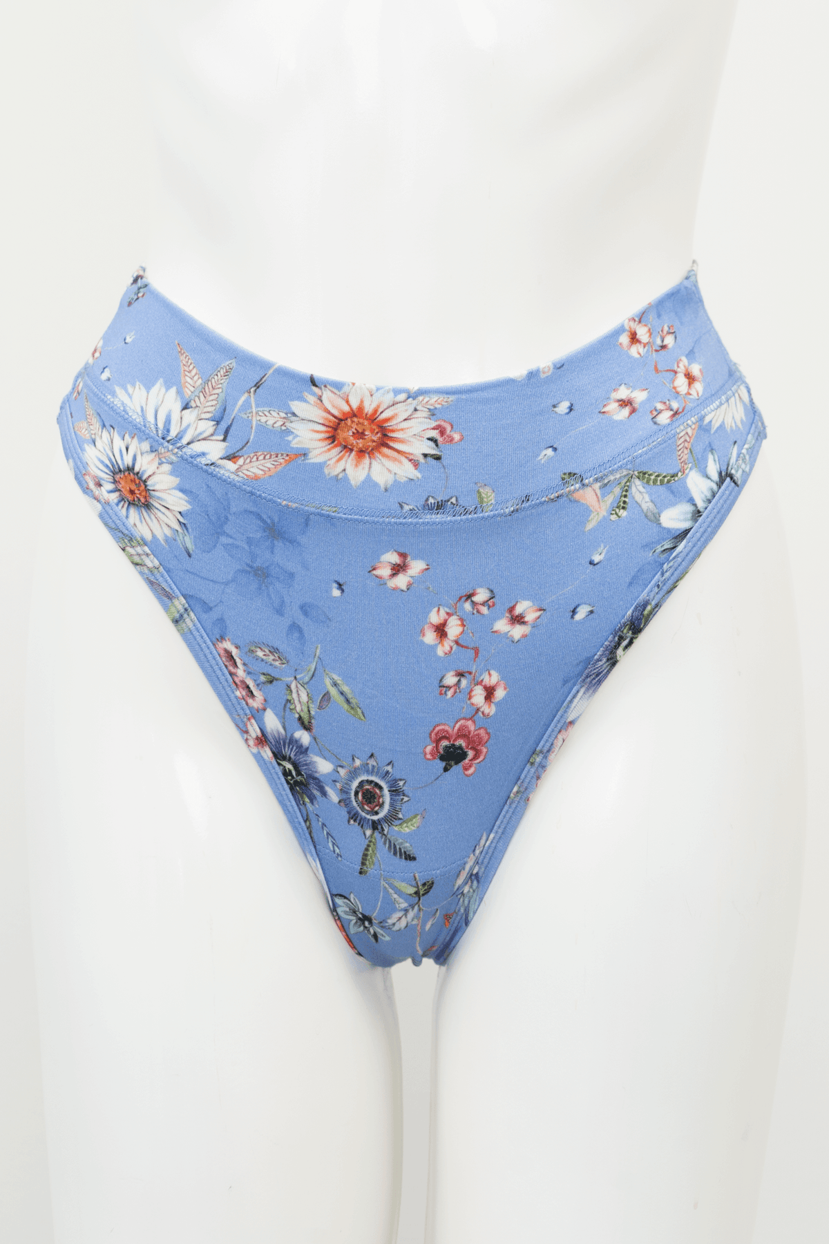 Front view of a blue floral high rise bamboo thong on mannequin