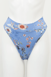 Front view of a blue floral high rise bamboo thong on mannequin