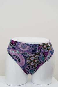 Front view of high rise bamboo thong underwear in purple geometric print on mannequin