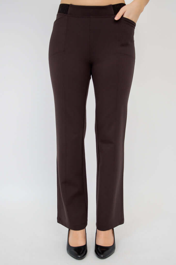 Front view of Daya Flared Modal Pants in coffee color with hand in pocket