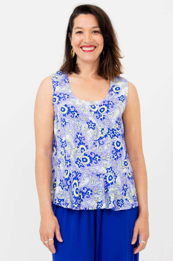 Front view of second model wearing Ginny Tank with blue and white paisley floral design