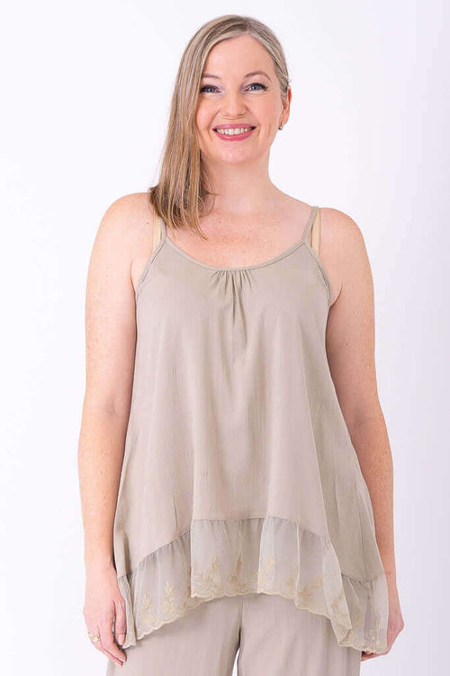 Front view of model wearing beige Chantilly Lace Tank with lace hem