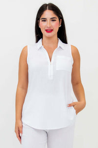 Front view of woman wearing sleeveless white tank top with quarter zipper and pocket