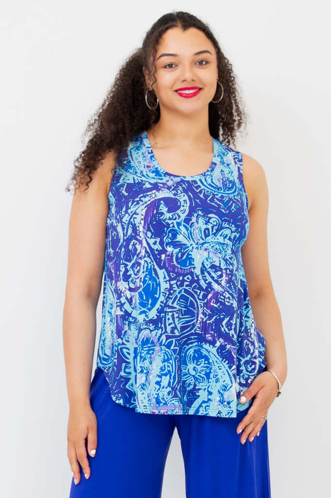 Front view of woman wearing a sleeveless blue paisley print bamboo tank top