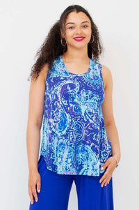 Front view of woman wearing a sleeveless blue paisley print bamboo tank top