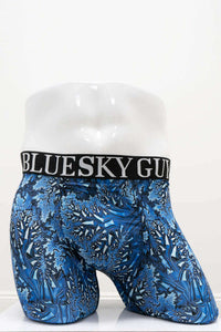 Front view of Middle Man Boxer Briefs in blue patterned bamboo fabric on mannequin