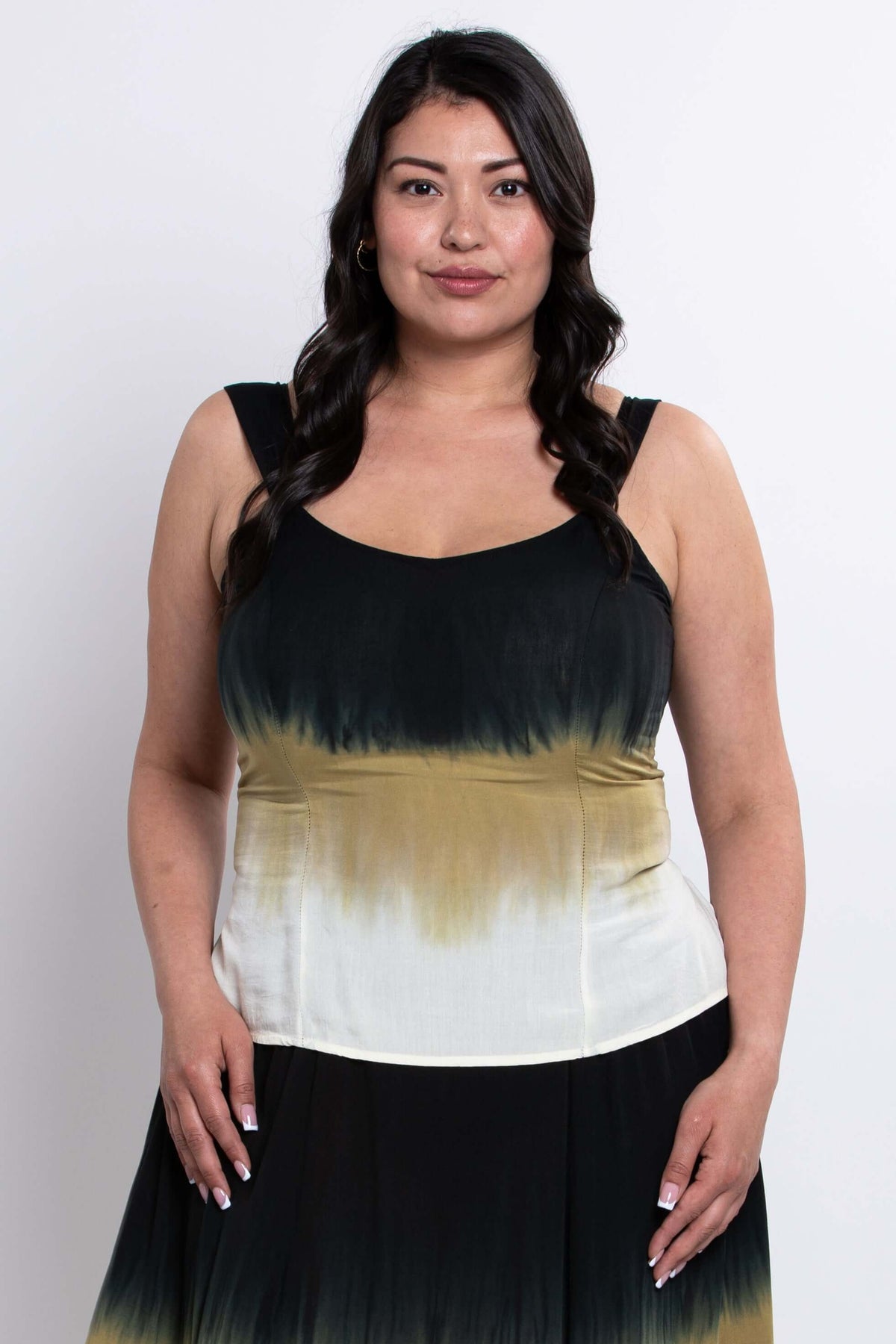 Front view of model wearing a dip dye tank top with wide straps and fitted bust