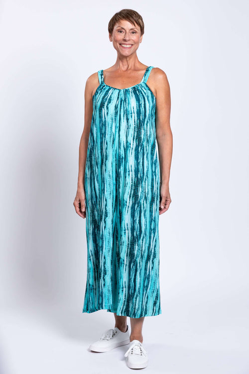 Front view of woman wearing Aqua Breeze sleeveless striped jumpsuit