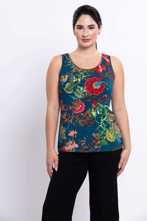 Front view of woman wearing vibrant floral bamboo tank top