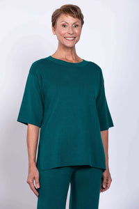 Front view of model wearing teal Bailey Sweater and pants set