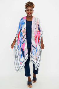 Front view of model wearing the Darcy floral kimono wrap in vibrant colors