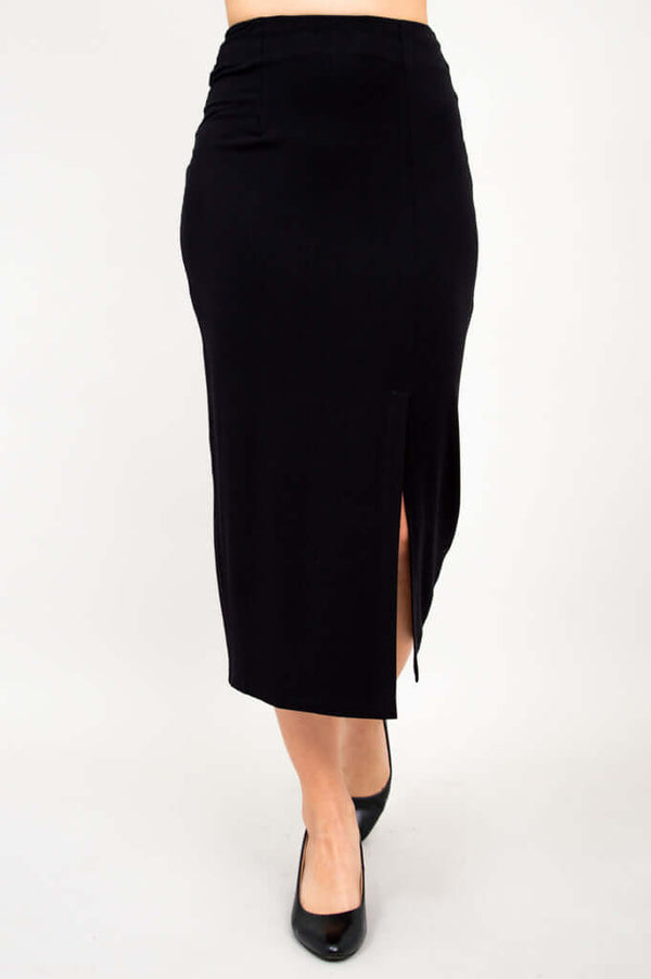 Front view of Eva long black slim skirt with a side slit