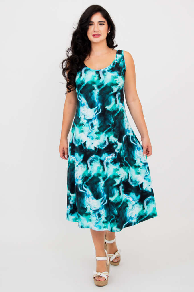 Front view of a woman wearing an aqua marble print Evangelina tank dress