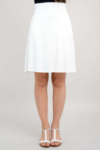Front view of white Magna Skort on model with sandals