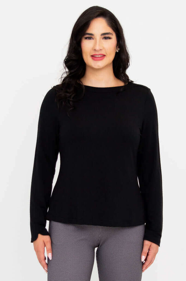 Front view of woman wearing black long sleeve Mona boat neck French Terry top