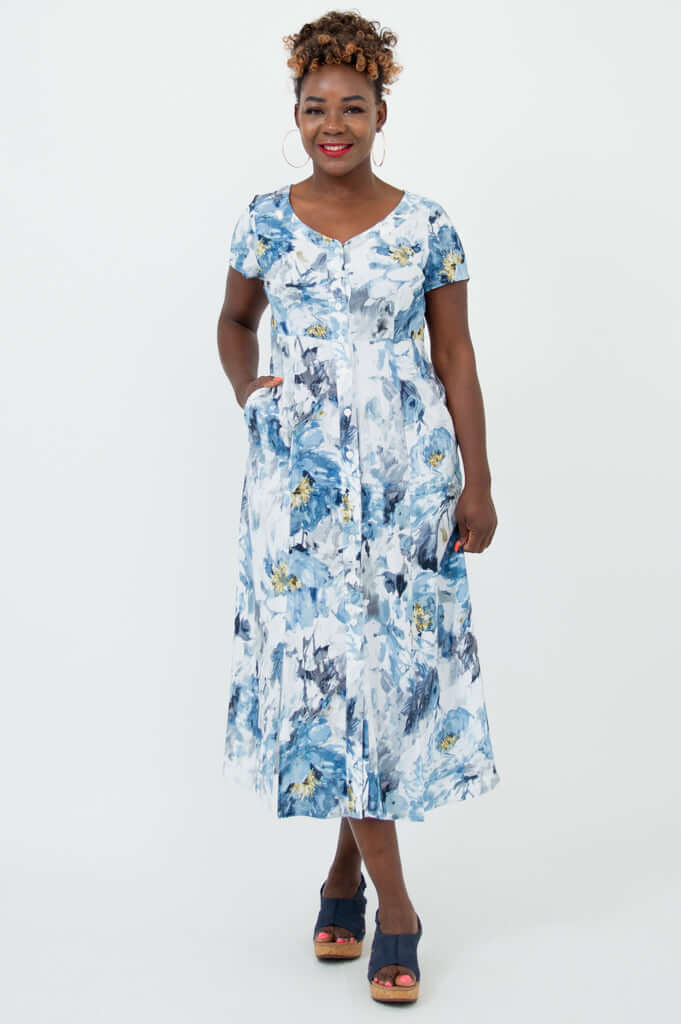 Front view of model wearing Morgan dress in blue and white watercolor floral print