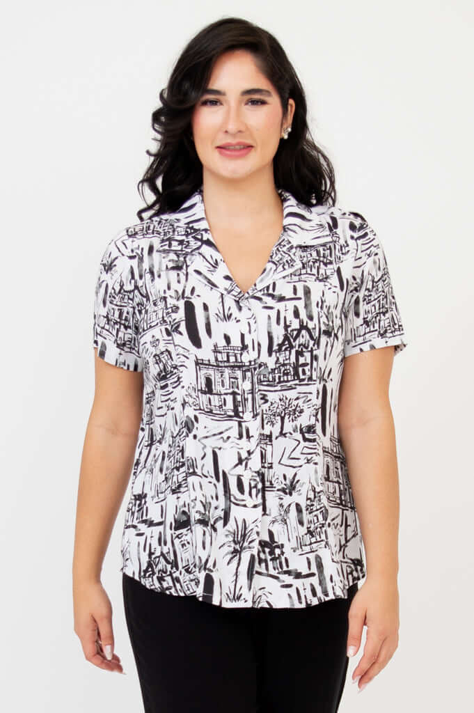 Front view of woman wearing Samantha black and white print short sleeve shirt