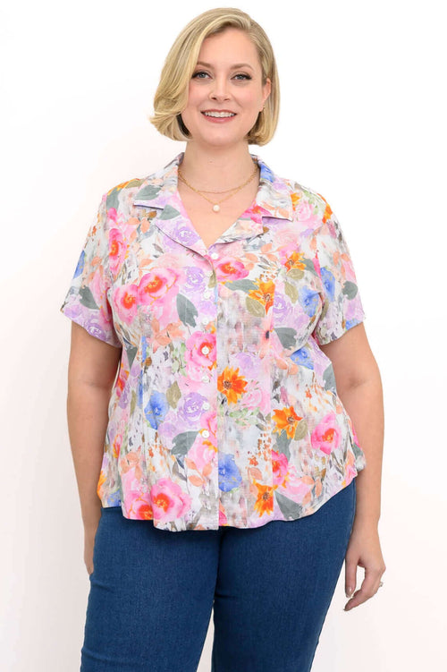 Front view of a woman wearing the Samantha linen bamboo floral shirt with jeans