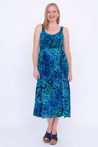 Front view of woman in Shauna empire waist blue A-line midi dress