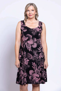 Front view of woman wearing Sweet Sara sleeveless dress in pink botanica print