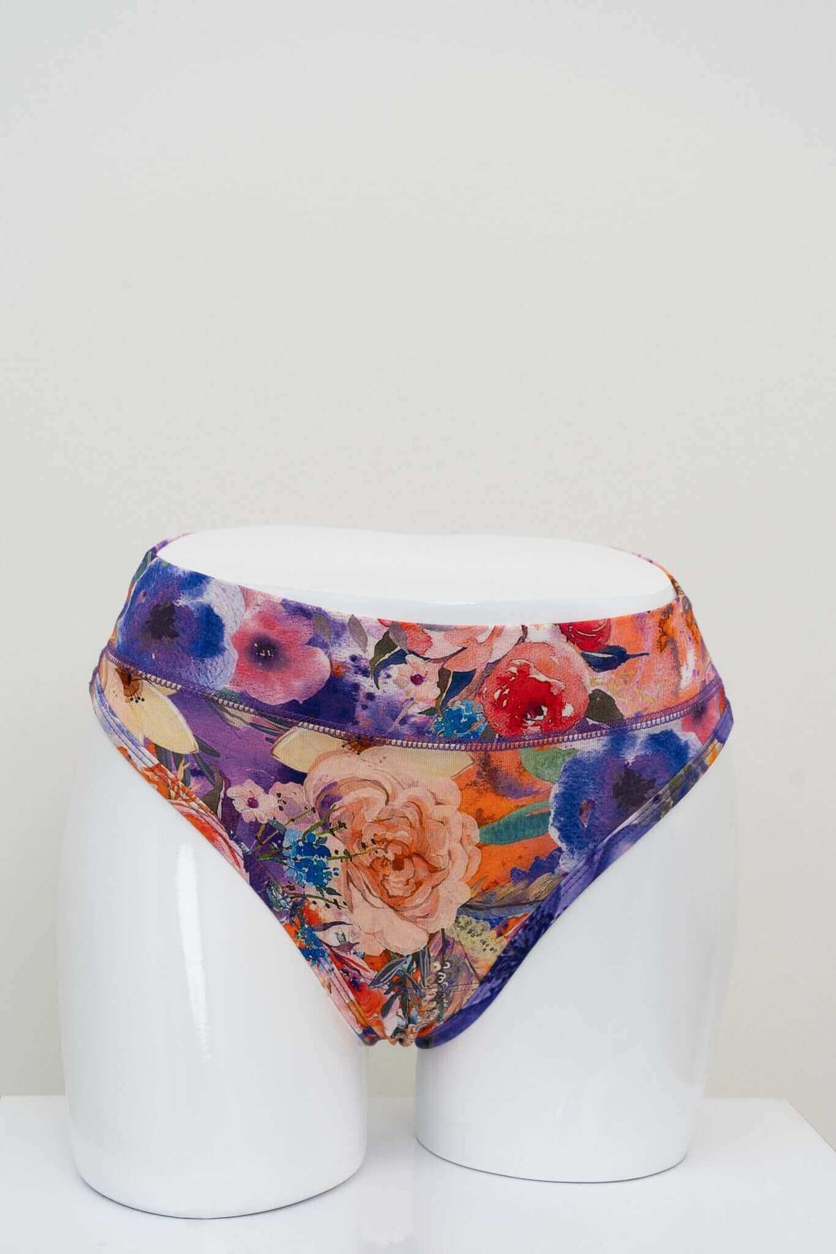Front view of floral bamboo high rise thong displayed on a mannequin