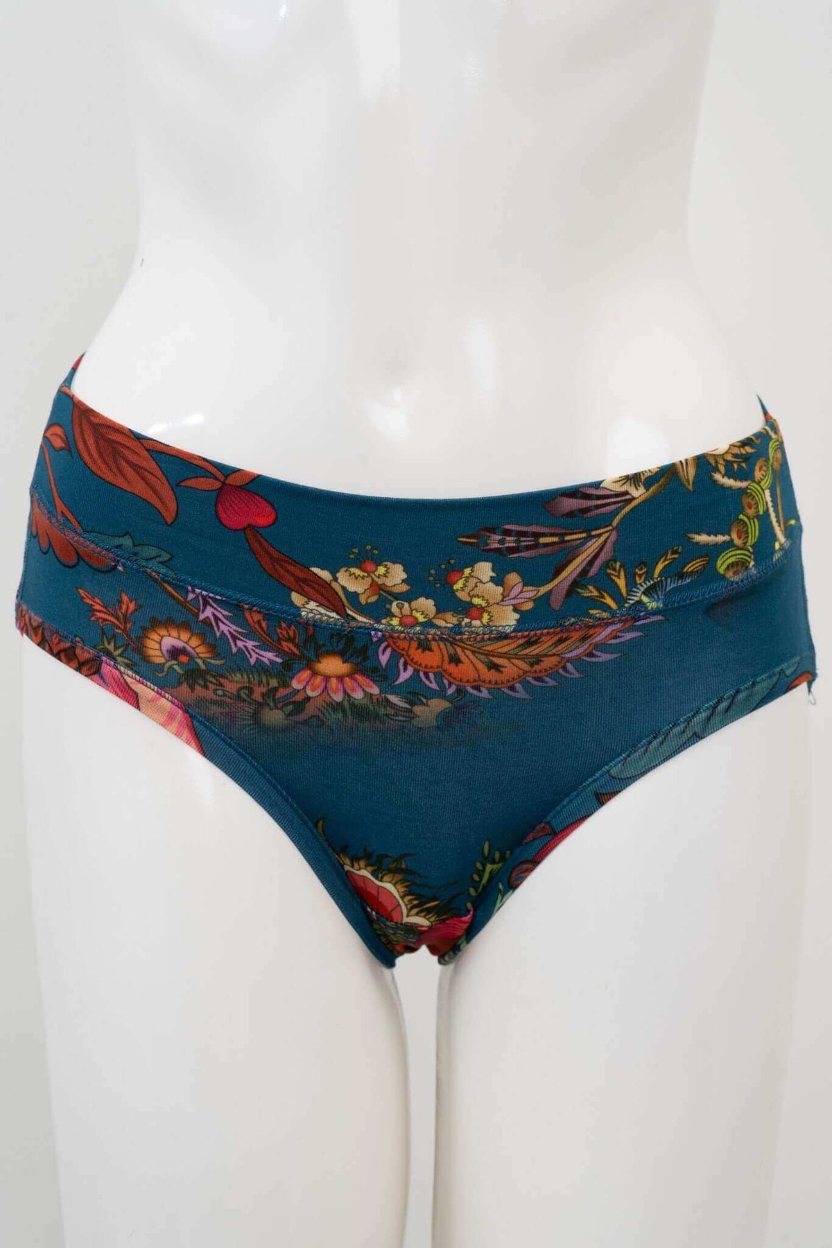 Front view of teal hipster underwear with vibrant floral print on mannequin