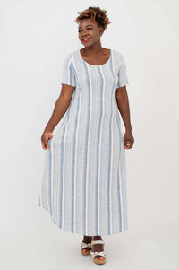 Woman modeling a flowy striped maxi dress with short sleeves, front view