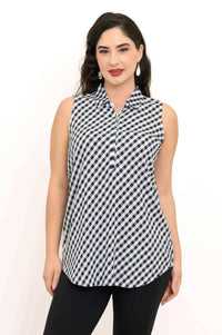 Front view of a woman wearing a sleeveless black and white gingham tank top