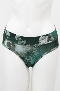 Front view of green hipster underwear with floral botanical print on mannequin