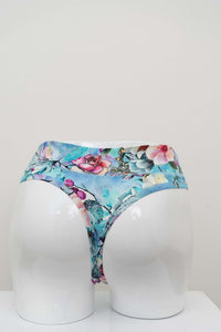 Front view of high-rise bamboo thong in a blue floral watercolor pattern