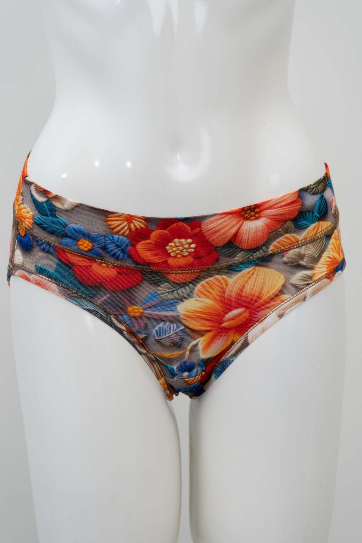 Front view of mesh floral briefs on mannequin