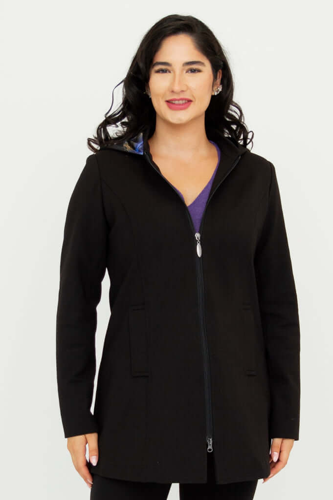Front view of model wearing The Highlands Coat zipped up
