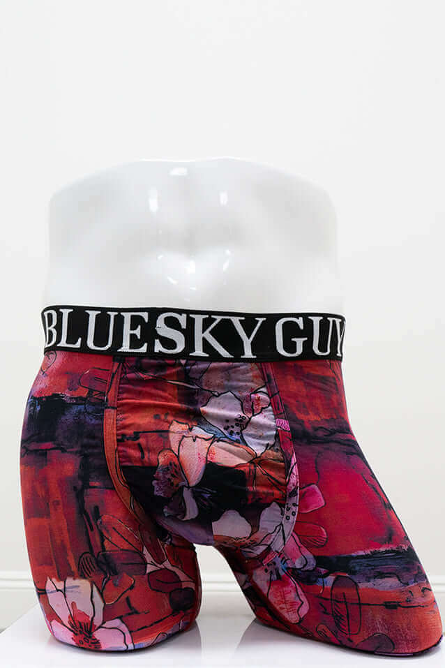 Front view of red floral bamboo men's underwear on mannequin with BLUESKYGUY waistband