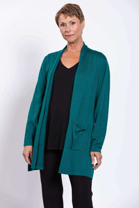 Front view of woman wearing teal Paige Sweater cardigan with black top and pants