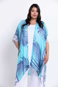 Front view of model wearing a turquoise and blue palm print kimono wrap