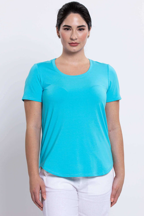 Front view of woman wearing a turquoise short sleeve scoop-neck tee