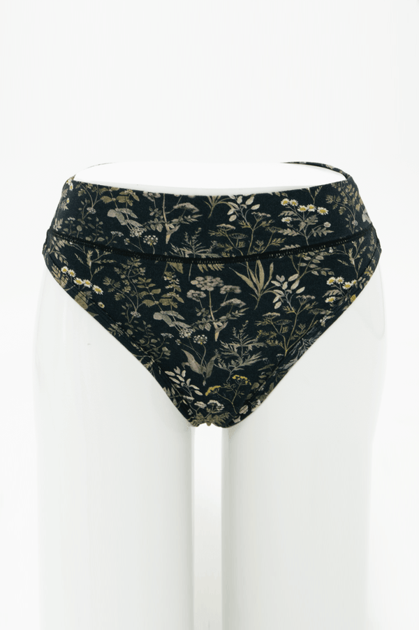 Front view of high rise thong underwear in black with wildflower print