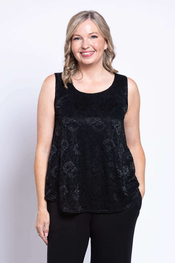 Front view of woman wearing black lace overlay sleeveless tank top