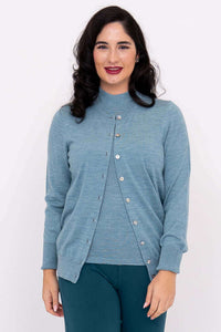 Front view of woman wearing blue Merino wool Kitten Cardigan with crew neck