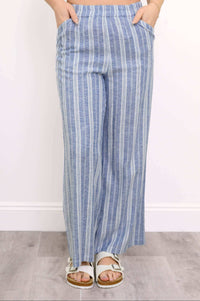 Parker Pant in blue stripes, front view with model's hands in pockets