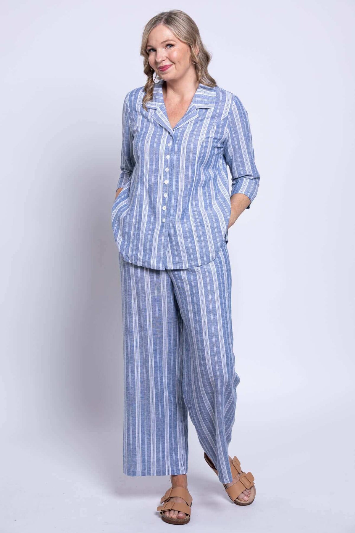 Full outfit view of model in blue striped Parker Pant and matching shirt
